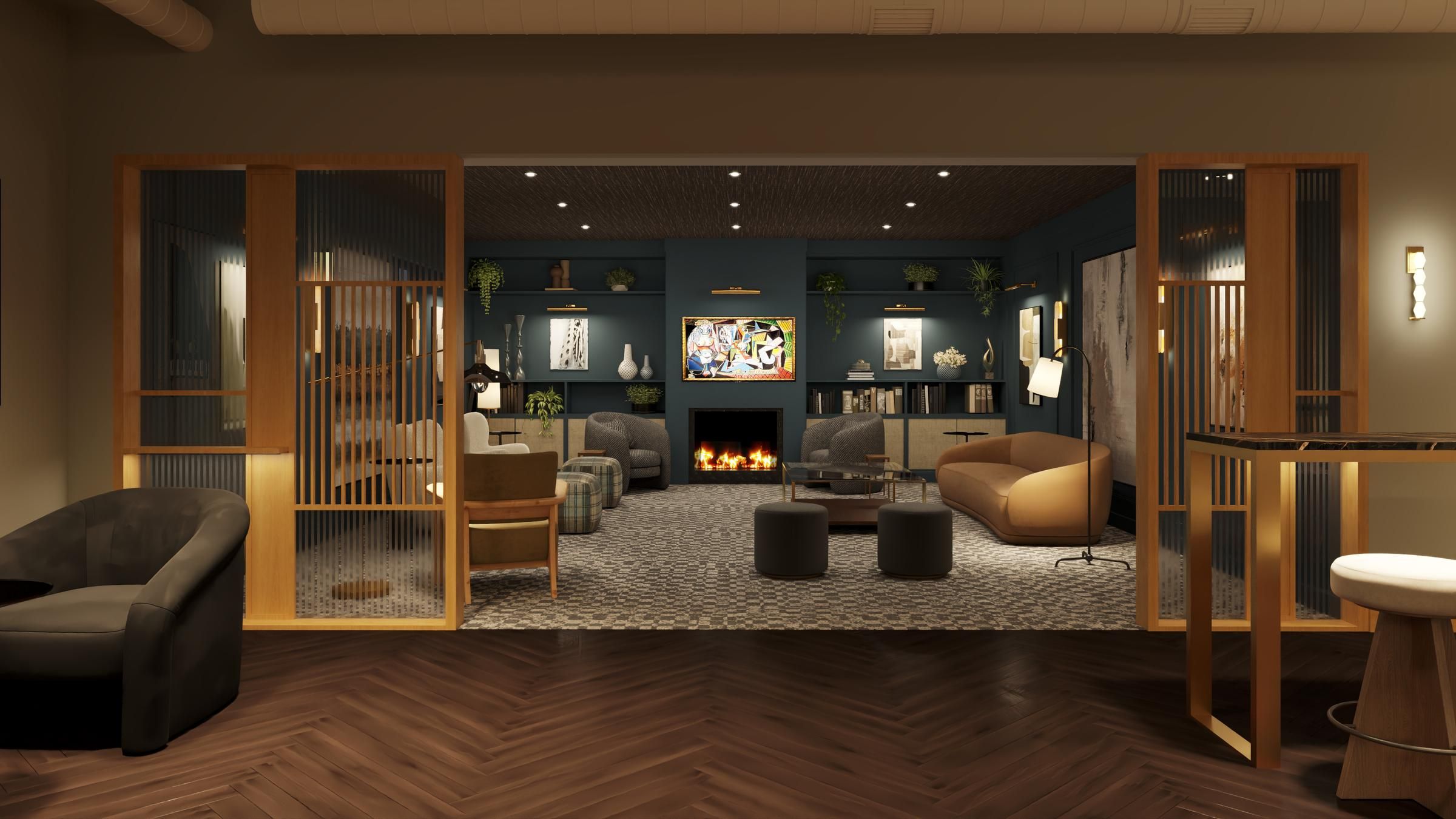 Sonder cozy living room featuring a fireplace surrounded by comfortable chairs.