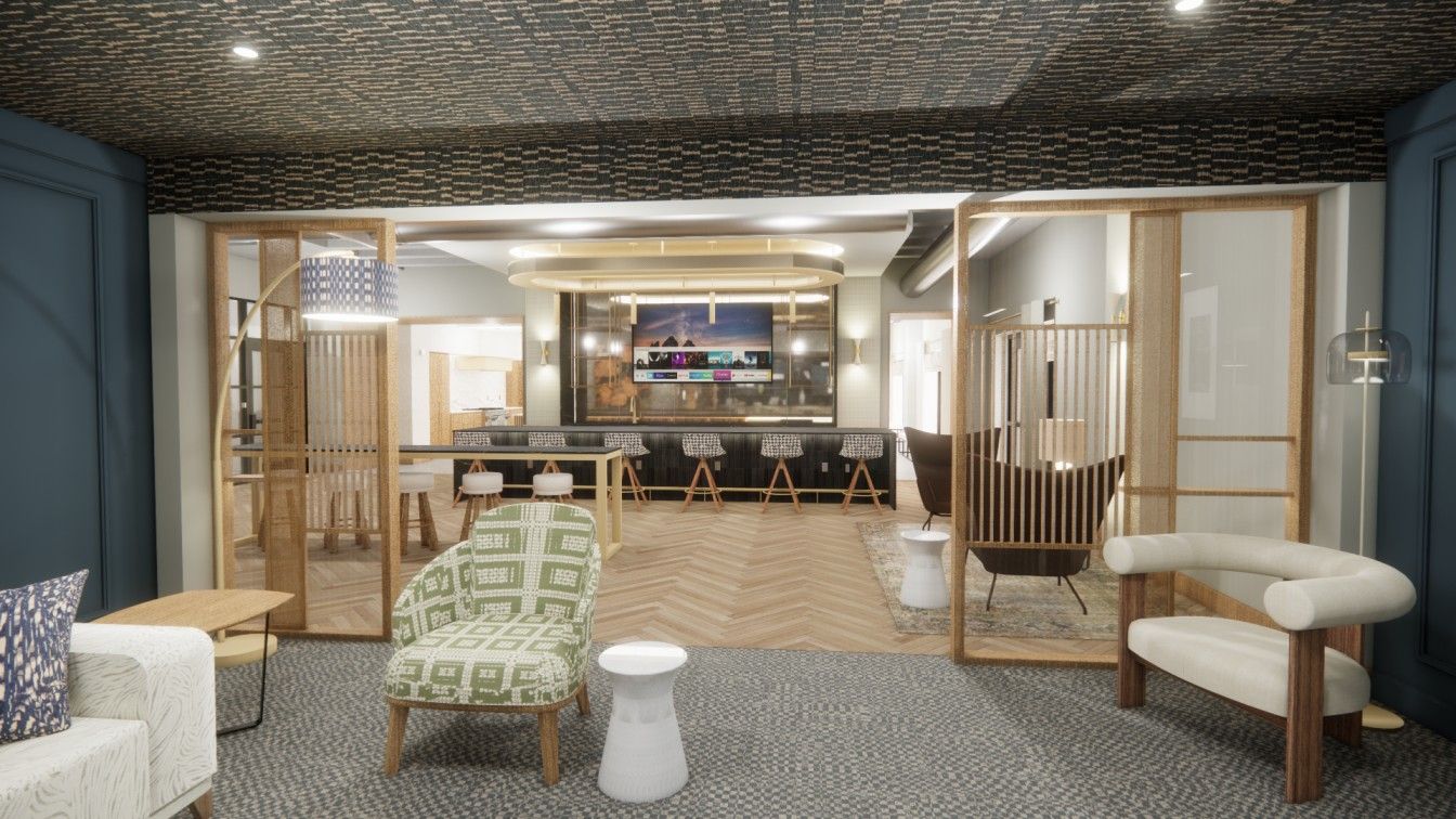 Sonder A modern lounge area featuring stylish furniture, a large TV screen, and a warm, inviting atmosphere with wood accents and decorative lighting.